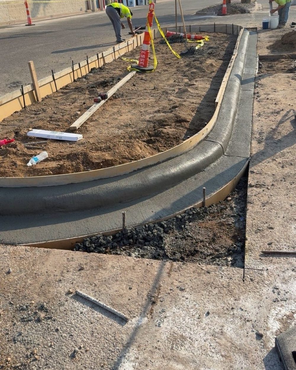 Curb and gutter concrete formwork with rebar in place